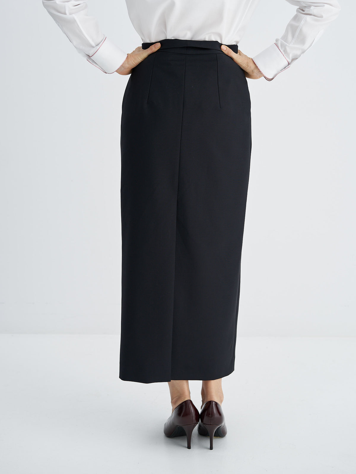 Back view of the wool-mohair skirt showing shaping darts, centre seam and slit