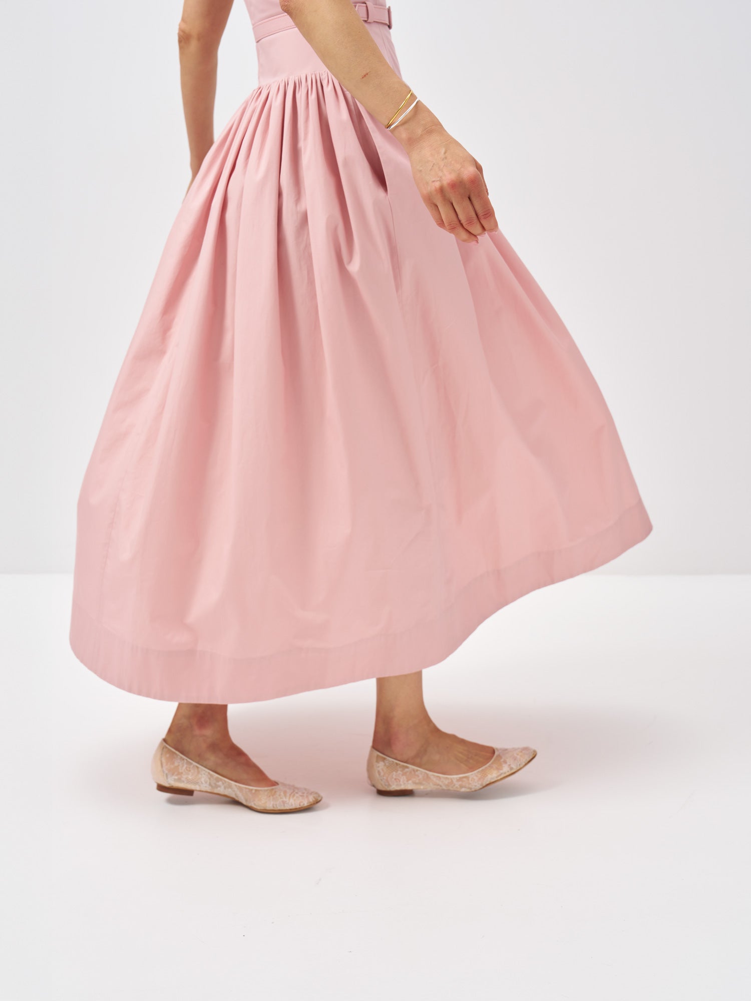 Detail of the cotton poplin fabric, matching belt and gathered waist construction