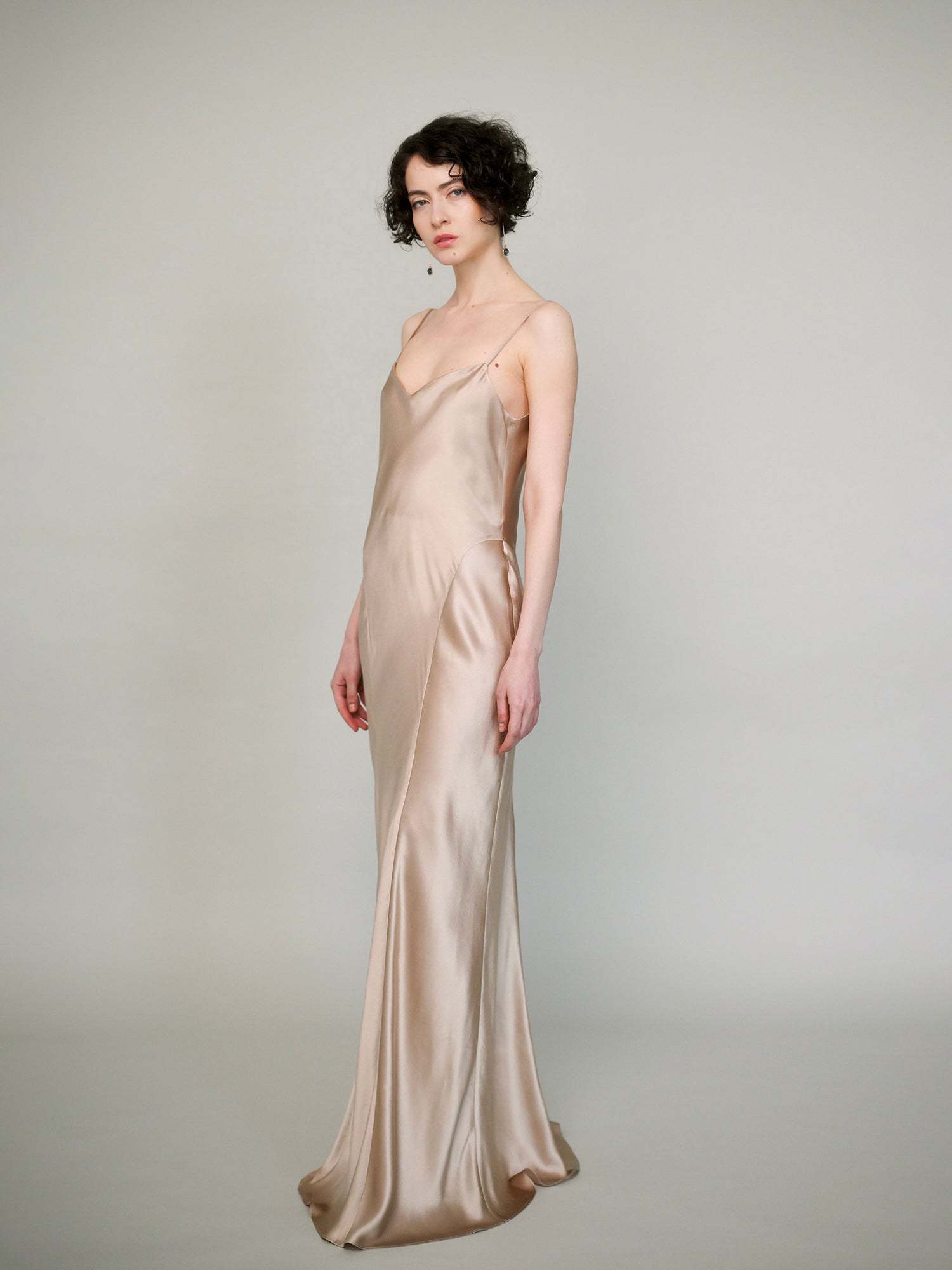 Floor-length silk dress, clean elongated line