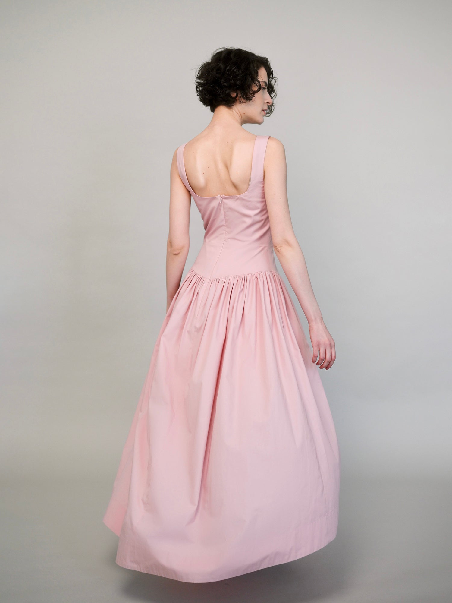 Full skirt movement, powder rose midi dress